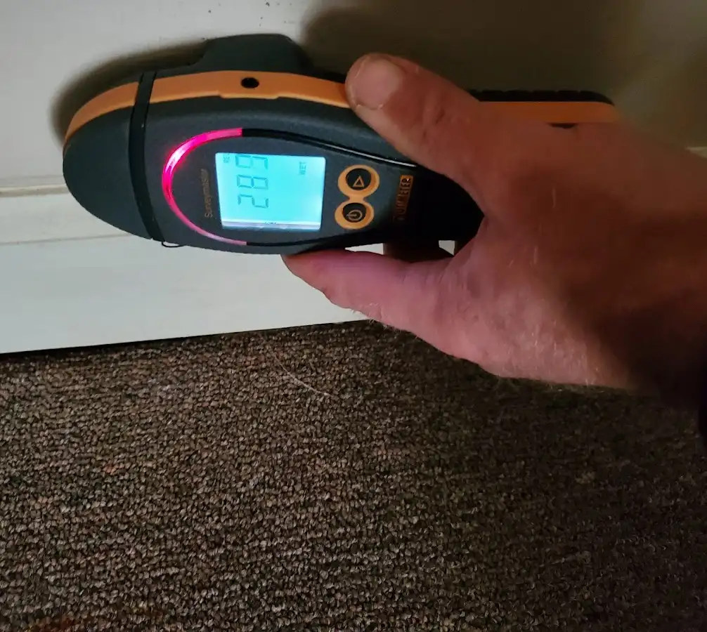 Moisture detection at baseboard during Burst Pipe Cleanup in Loma Linda